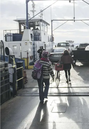  ?? ( TYLER ANDERSON / NATIONAL POST ?? A normal city would have bridged or tunnelled the eastern and western gaps for pedestrian­s ages ago, and left any remaining ferry demand to the
private sector, the Post’s Chris Selley writes.