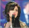  ?? Peter Macdiarmid Getty Images ?? AMY WINEHOUSE won several top awards in 2008.