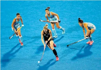  ?? Photo / Getty Images ?? Stacey Michelsen is the only figure in black amid a sea of blue in the loss to Argentina.