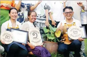  ?? HENG CHIVOAN ?? The three winners of the inaugural Khmer Cooking Contest show off their awards at the Chef Nak Culinary Art Centre in Kandal province on March 10.