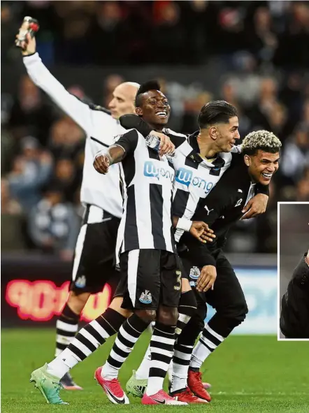  ??  ?? Party time: Christian Atsu (centre) celebrates with Ayoze Perez (second from right) and DeAndre Yedlin after Newcastle’s promotion to the English Premier League at St James’ Park on Monday. Inset: Newcastle manager Rafa Benitez showing the thumbs-up...