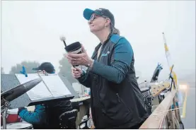  ?? PETER LEE WATERLOO REGION RECORD ?? Former students of music teacher Gary Tomlin performed on a float in honour of their teacher who died earlier this year. Gary's widow, Karen, plays the cowbell on the float.