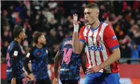  ?? Photograph: Lluís Gené/AFP/Getty Images ?? Artem Dovbyk celebrates after scoring his third goal in six minutes as Girona quickly regained top spot in La Liga.