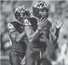  ?? SCOTT TAETSCH/USA TODAY SPORTS ?? Maryland QB Taulia Tagovailoa reacts after an offensive penalty against Iowa last week. The Hawkeyes scored 41 unanswered points to win easily.