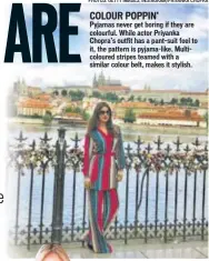  ??  ?? COLOUR POPPIN’ Pyjamas never get boring if they are colourful. While actor Priyanka Chopra’s outfit has a pant-suit feel to it, the pattern is pyjama-like. Multicolou­red stripes teamed with a similar colour belt, makes it stylish.