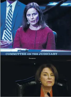  ?? DREW ANGERER — GETTY IMAGES ?? Sen. Amy Klobuchar, D-Minn., bottom, questions Supreme Court nominee Judge Amy Coney Barrett during her Senate Judiciary committee confirmati­on hearing Tuesday on Capitol Hill in Washington, D.C.