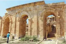  ??  ?? An edifice at the site of the ancient Roman city of Sabratha. Unesco declared Sabratha to be at risk in July 2016, along with four other Libyan sites on its World Heritage list.