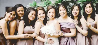  ??  ?? Bridesmaid­s Michelle Antonio, Niña Gonzales, Ida Bernardo, Kim Pua, the bride Melissa , Melanie Go, Genna Gobing, Larrissa Ong