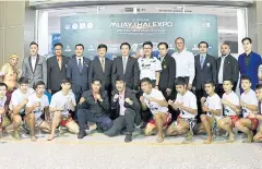  ??  ?? Organisers and fighters of the Muay Thai Expo pose at a recent press conference.