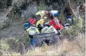  ?? Photo: NELSON MARLBOROUG­H
RESCUE HELICOPTER ?? Tricky save: Emergency staff treat two women seriously injured after their farm vehicle plunged into a Tapawera gully.