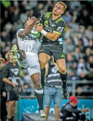  ??  ?? FANTASTIC FAREWELL: Ihaia West contests a high ball with a Sharks opponent in his last outing on McLean Park before heading to France.