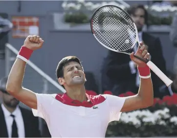  ??  ?? 0 Novak Djokovic celebrates after his win over Kei Nishikori at the Madrid Open yesterday.