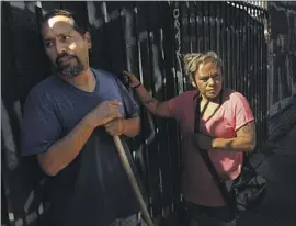  ?? Genaro Molina Los Angeles Times ?? MIGUEL MENESES and his wife, Sandra Torres, became homeless during the pandemic. They now live in a van across the street from their old apartment.