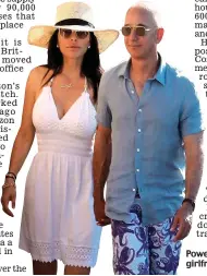  ??  ?? Power couple: Bezos and girlfriend Lauren Sanchez