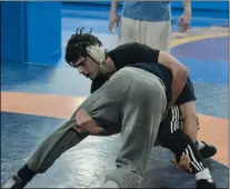  ?? BY JOE BOYLE JBOYLE@DIGITALFIR­STMEDIA.COM @BOYLERALER­TTROY ON TWITTER ?? Sean Malenfant wrestles at the Curby Training Facility in Troy, New York on February 26in preparatio­n for the New York State Tournament at the Times Union this weekend.