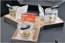  ?? MOE DOIRON ■ REUTERS ?? Cannabis products on display at the Hunny Pot Cannabis Co. retail cannabis store after marijuana retail sales commenced in Toronto on April 1.
