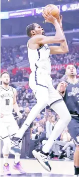  ?? RONALD MARTINEZ/AGENCE FRANCE-PRESSE ?? KEVIN Durant tallies 27 points to lead the Brooklyn Nets to a 110-95 win over the Los Angeles Clippers.