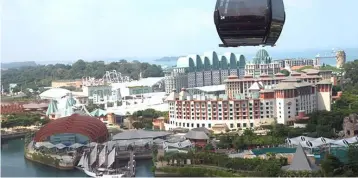  ??  ?? Despite being inline, the earnings for Genting Singapore’s 2Q18 saw a 32 per cent sequential decline attributab­le to poor luck factor as Resort world Sentosa saw its rolling chip win falling to 2.6 per cent in 2Q18 from 3.2 per cent in 1Q18. — AFP photo