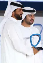  ??  ?? Sheikh Maktoum presents Arab Social Media Influencer­s Award to Sheikh Nasser from Bahrain.