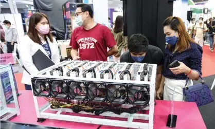  ?? Photograph: Adirach Toumlamoon/Pacific Press/Rex ?? Digital coin mining hardware at Thailand Crypto Expo 2022 in Bangkok.