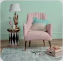  ??  ?? A setting that shows how soft sage - a grey green – is well complement­ed by pinks and metallic touches, image features Pink Chair, £179.99; Glass Flamingo Ornament, £19.99, and Monochrome Side Table, £39.99, all Homesense.