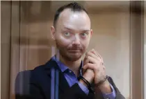  ?? AP PHOTO ?? IVAN THE TERRORIZED
This July 16, 2020 file photo shows former journalist Ivan Safronov standing behind a glass cage in a courtroom in Moscow.