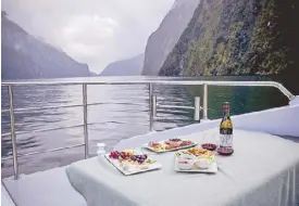  ??  ?? Luxury aboard the five-star catamaran Fiordland Jewel, which can take up to 20 people on a cruise of Milford Sound.