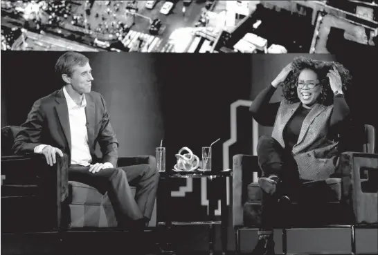  ?? KATHY WILLENS / ASSOCIATED PRESS ?? Beto O’rourke, left, appears with Oprah Winfrey for “Oprah’s Supersoul Conversati­ons from Times Square” on Feb. 5 in New York.