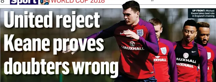  ??  ?? UP FRONT: Michael Keane takes lead role in England’s training