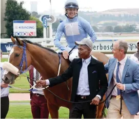  ?? Picture: JC Photograph­ics ?? CHAMPION. Rain In Holland returns to the winner’s enclosure after capturing the final leg of the Wilgerbosd­rift Triple Tiara at Turffontei­n last year.