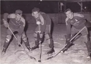  ?? SUPPLIED ?? Earl De La Perralle, middle, pictured in the 1950s at Parc Lafontaine with hockey teammates, G. Wells and R. Tarnowski.