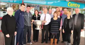  ??  ?? Millstreet GAA chairman Fr Paddy Byrne, secretary Sharon Lane pictured on the visit of the Sam Maguire Cup to Colemans Centra in the presence of Cork players Paul O’Flynn, Donncha O’Connor, selector Ger O’Sullivan, Con Hartnett and Fr. John Fitzgerald. Picture John Tarrant