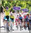  ?? ?? Australia’s Georgia Baker celebrates winning gold as Scotland’s Neah Evans, (right), takes silver during the Women’s Road Race in Warwick, England on day ten of the 2022 Commonweal­th Games. (AP)