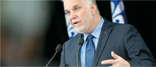  ??  ?? Philippe Couillard veut convaincre les Canadiens de rouvrir la Constituti­on et d’y reconnaîtr­e la nation québécoise.