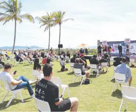  ?? Picture: PETER WALLIS ?? FIGHTING CHANCE: Social distancing during the weigh-in ahead of the fight between Tim Tszyu and Jeff Horn at Townsville Casino.