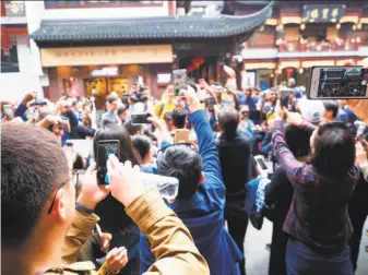  ?? Cal Athletics ?? The Cal men’s basketball team was swarmed by fans upon its arrival in China on Sunday.