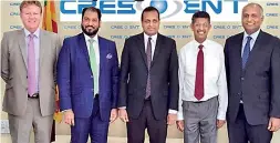  ??  ?? Crescent Global and NITF officials with National Policies and Economic Affairs State Minister Niroshan Perera