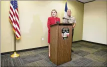  ?? JAY JANNER / AMERICAN-STATESMAN ?? Travis County Sheriff Sally Hernandez speaks at a news conference in July at the sheriff’s office. At right is Maj. Wes Priddy. Hernandez has defended “sanctuary cities.”
