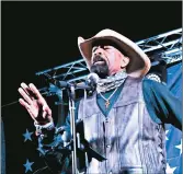  ?? JESSE WRIGHT/DAILY SOUTHTOWN ?? Former Milwaukee County Sheriff David Clarke addresses the GOP Jamboree crowd Friday in Homer Glen.