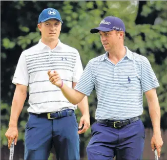  ?? GETTY IMAGES ?? Jordan Spieth (left) got a year’s head-start on Justin Thomas on the PGA Tour and began his run to the top of the rankings. With five wins, including a major this season, Thomas is catching up.