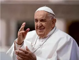  ?? Andrew Medichini/associated Press ?? Pope Francis waves as he leaves after his weekly general audience in St. Peter’s Square at The Vatican on Wednesday. Pope Francis will visit Indonesia, East Timor, Papua New Guinea and Singapore in September, the Vatican announced Friday, confirming the longest trip of Francis’ papacy that is sure to test his health, stamina and mobility.