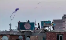  ??  ?? Children flying kites in Cairo, Egypt. Photograph: Khaled Desouki/AFP/Getty Images