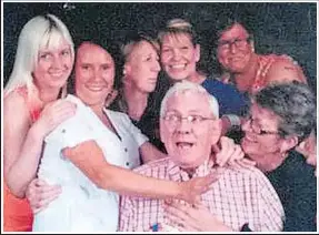  ??  ?? Happier times… Army vet Ronnie Miller surrounded by family members