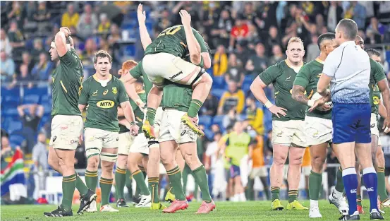  ?? REUTERS ?? South Africa players react at full-time after the Springboks defeated the All Blacks in the final round of the Rugby Championsh­ip on Saturday.