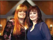  ?? RICK MAIMAN — THE ASSOCIATED PRESS ?? Wynonna Judd, left, and mother Naomi appear on the set of Naomi Judd's television show in 2006.