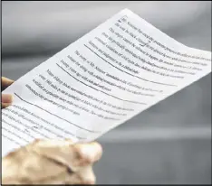  ?? J. SCOTT APPLEWHITE/AP ?? Holding a transcript of her speech in the Senate Chamber on Wednesday, Sen. Elizabeth Warren, D-Mass. reacts to being rebuked by the Senate leadership and accused of impugning then Attorney General-designate, Sen. Jeff Sessions, R-Ala.