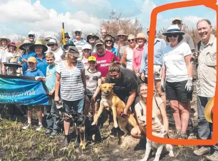  ??  ?? Environmen­tal groups such as Save Our Broadwater have posted photos on their Facebook pages of volunteers, including leaders Judy Spence and Alan Rickard (far right), working at The Spit in response to criticism by GC Mayor Tom Tate.