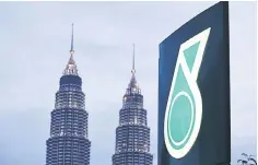  ?? — Reuters photo ?? Petronas was also among the first in Malaysia to be certified with the ISO 37001:Anti Bribery Management System certificat­ion.