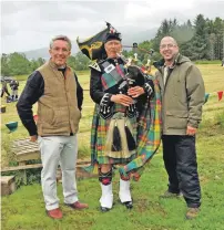  ??  ?? Chieftain of the games, Peter Lawson with piper Graham Buchanan and new games committee chairman Kenny McLaughlin.