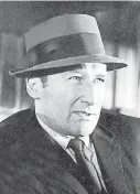  ?? [AP FILE PHOTO] ?? Writer Mickey Spillane appears in character from the film “The Girl Hunters” in New York in this July 1963 photo.